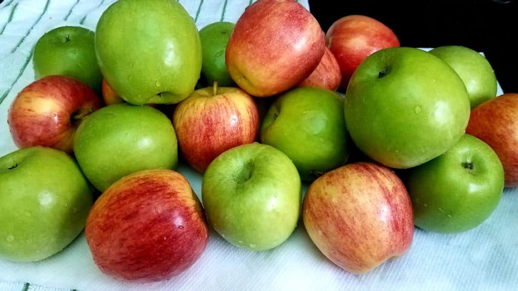 A pile of red and green apples.