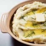 A dish with fluffy Instant Pot mashed potatoes.