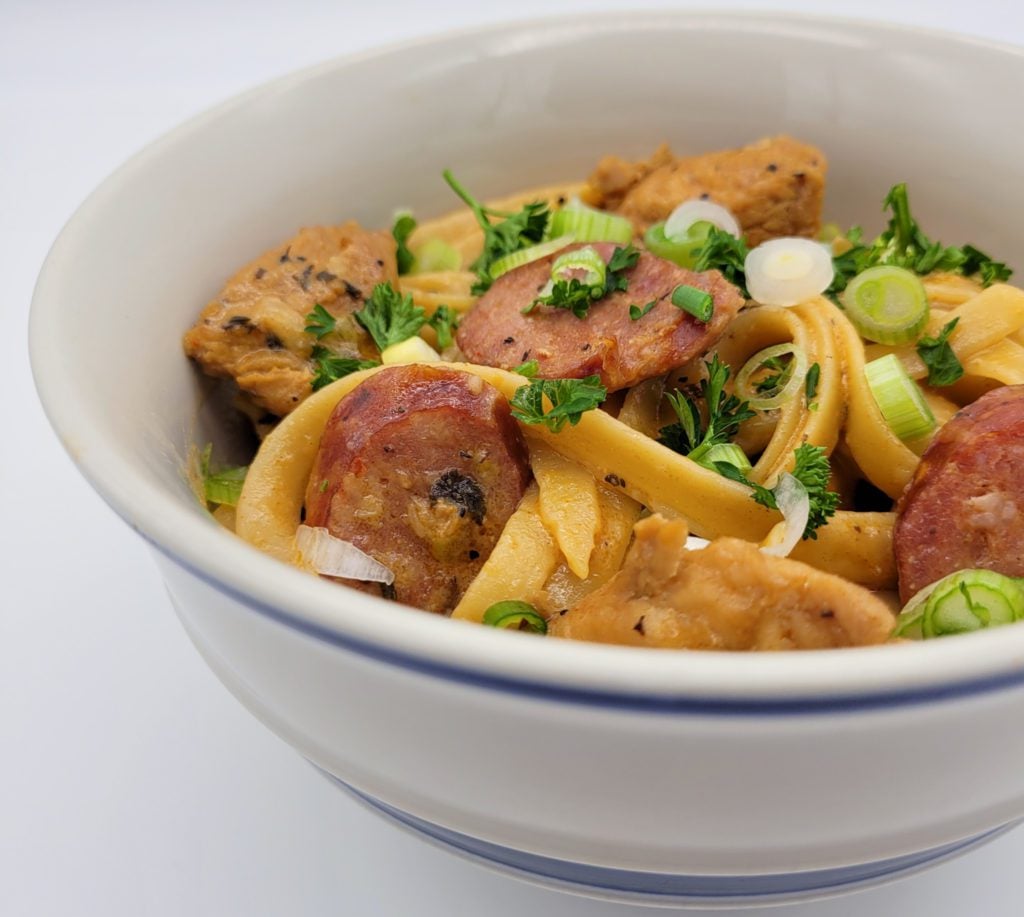 Bowl of creamy Cajun chicken pasta.
