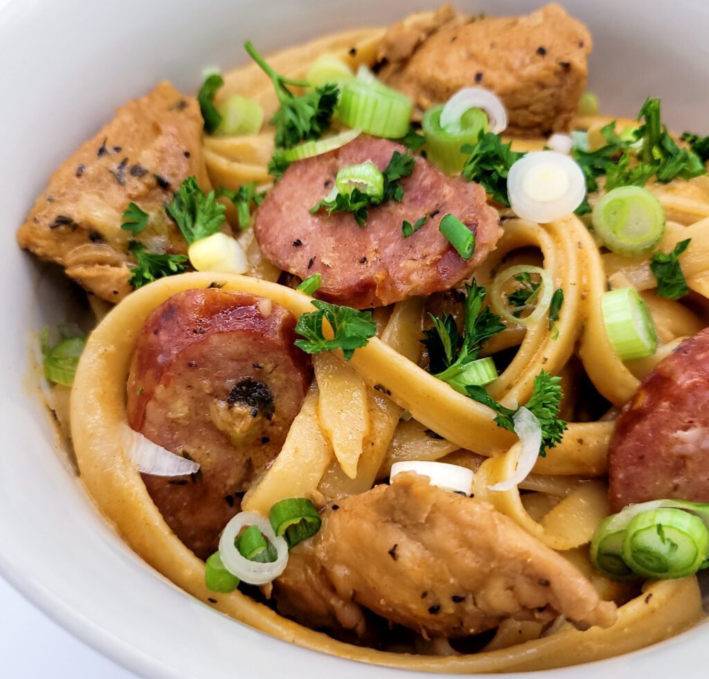 A bowl of creamy Cajun chicken pasta.