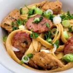A bowl of creamy Cajun chicken pasta.