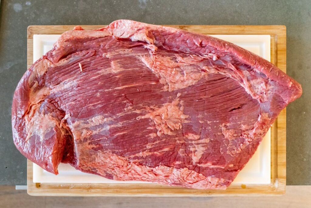 A slab of raw beef brisket