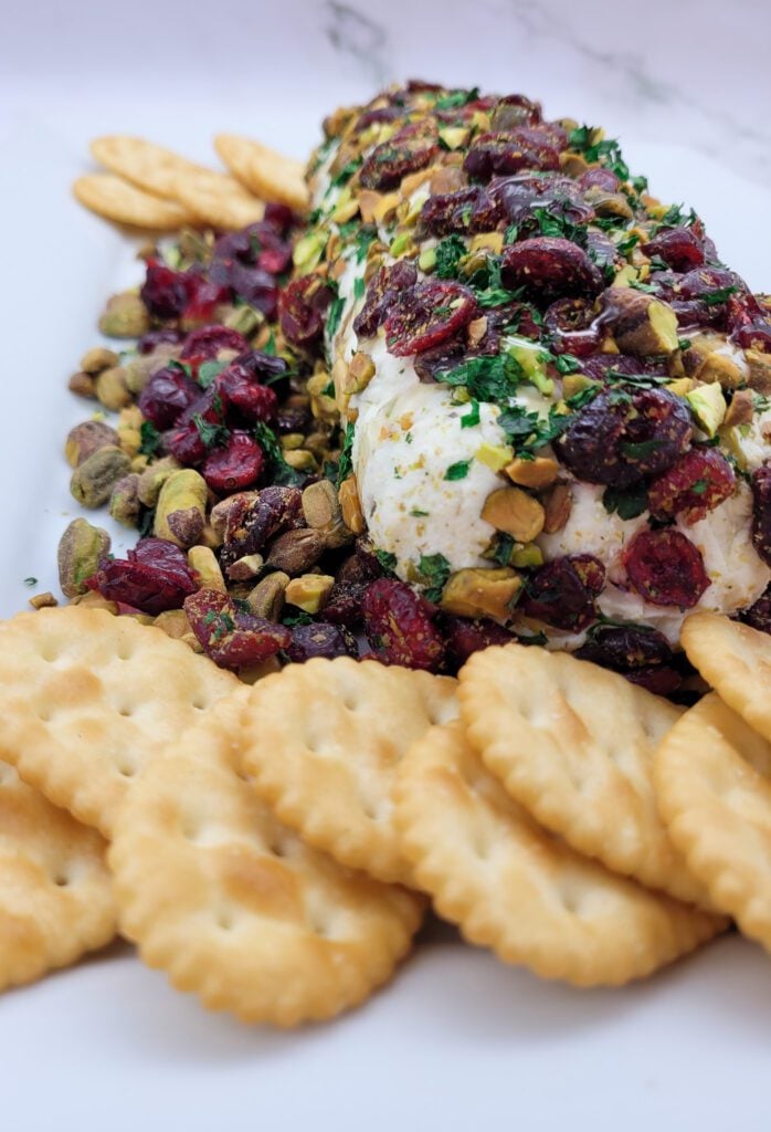 A front view of a Cranberry Pistachio Cheese Log