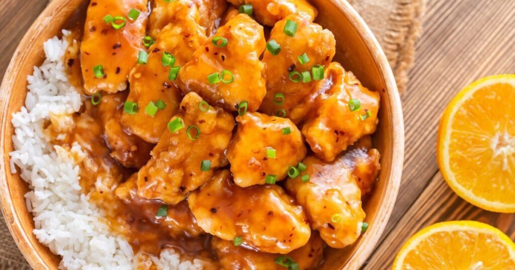A bowl of orange chicken