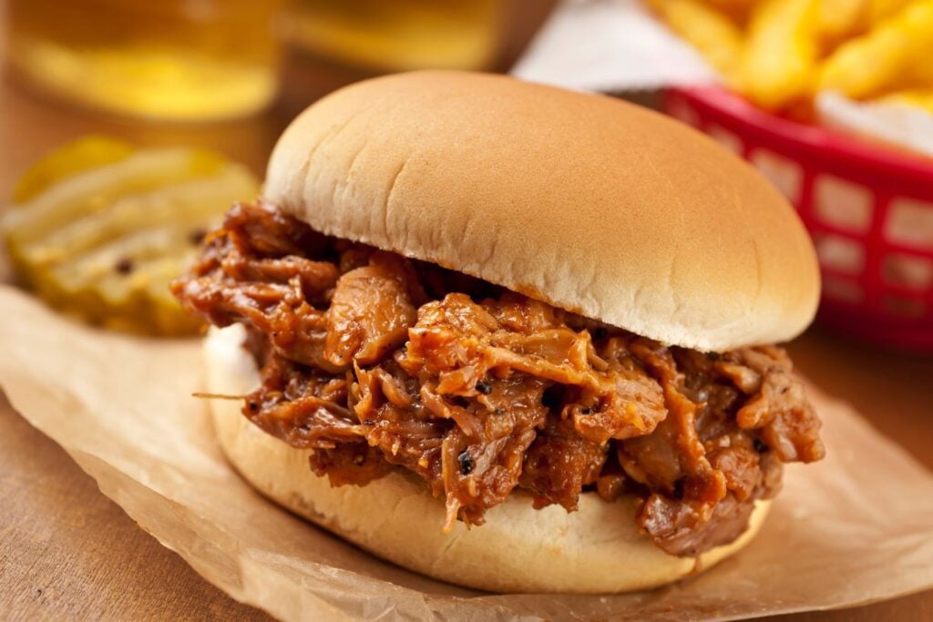 A pulled pork sandwich on a bun